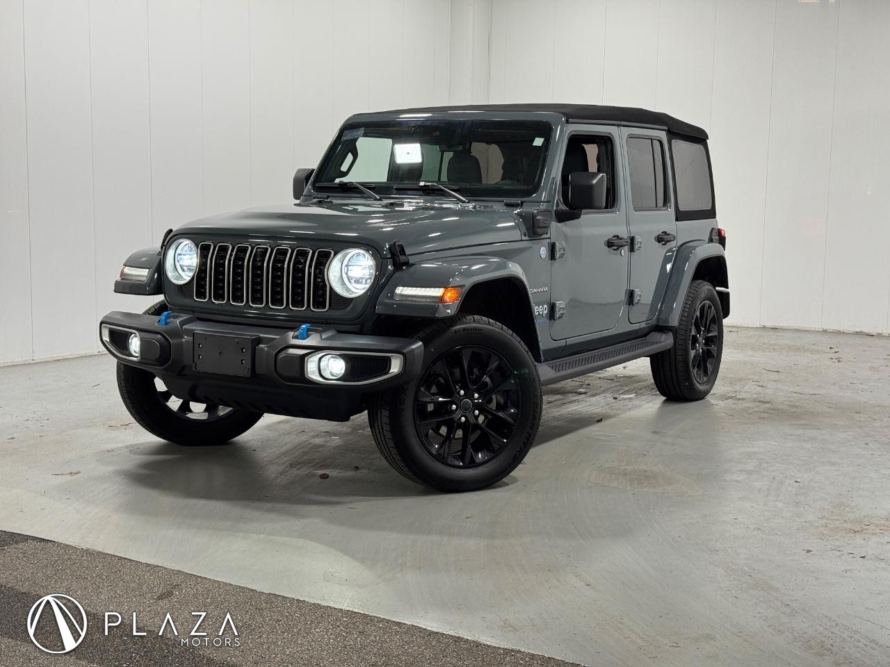Used 2024 Jeep Wrangler 4xe Sahara 4XE with VIN 1C4RJXP67RW142668 for sale in Creve Coeur, MO