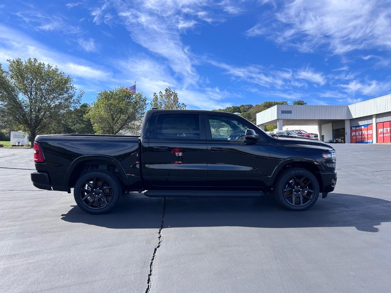 2025 Diamond Black Crystal Pearlcoat Ram 1500 Laramie 4X4 Truck