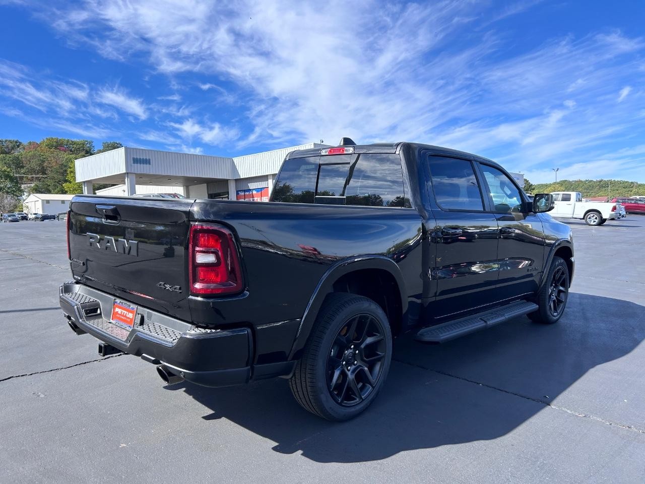 2025 Diamond Black Crystal Pearlcoat Ram 1500 Laramie 4X4 Truck