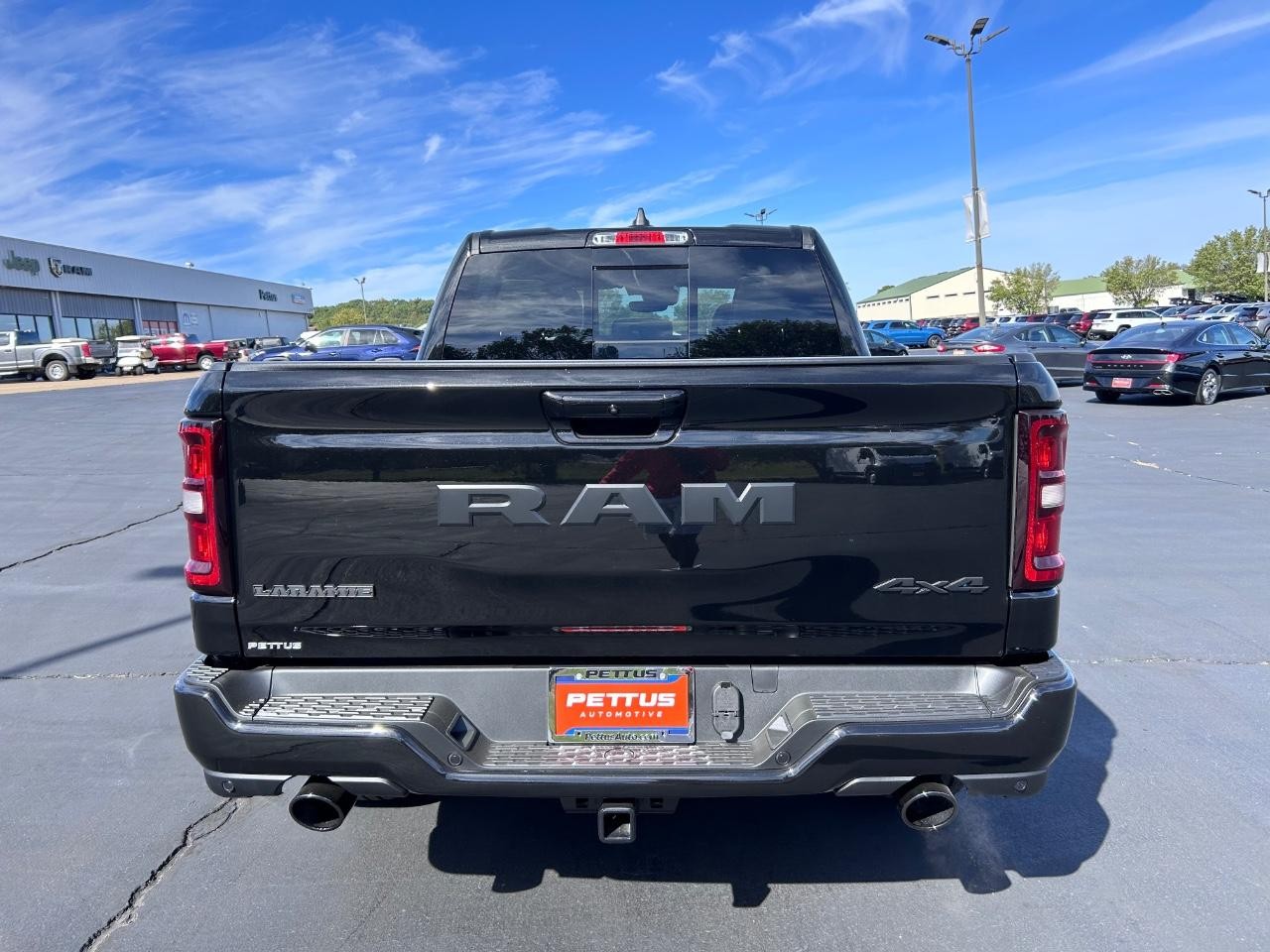 2025 Diamond Black Crystal Pearlcoat Ram 1500 Laramie 4X4 Truck