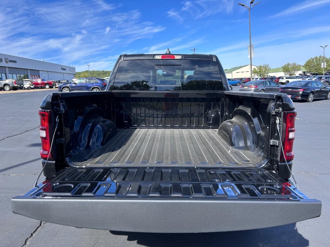 2025 Diamond Black Crystal Pearlcoat Ram 1500 Laramie 4X4 Truck