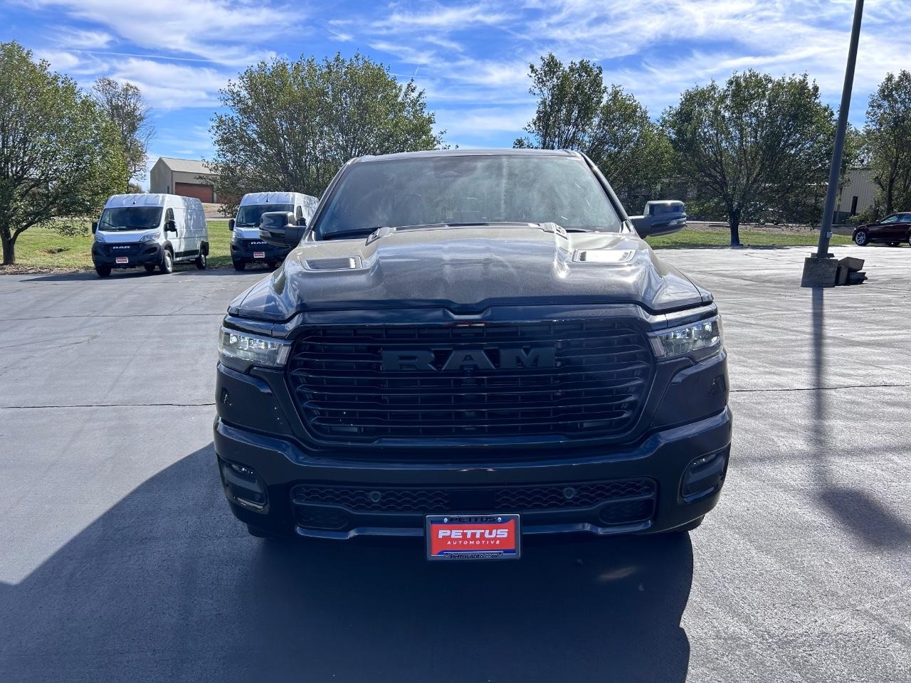 2025 Diamond Black Crystal Pearlcoat Ram 1500 Laramie 4X4 Truck