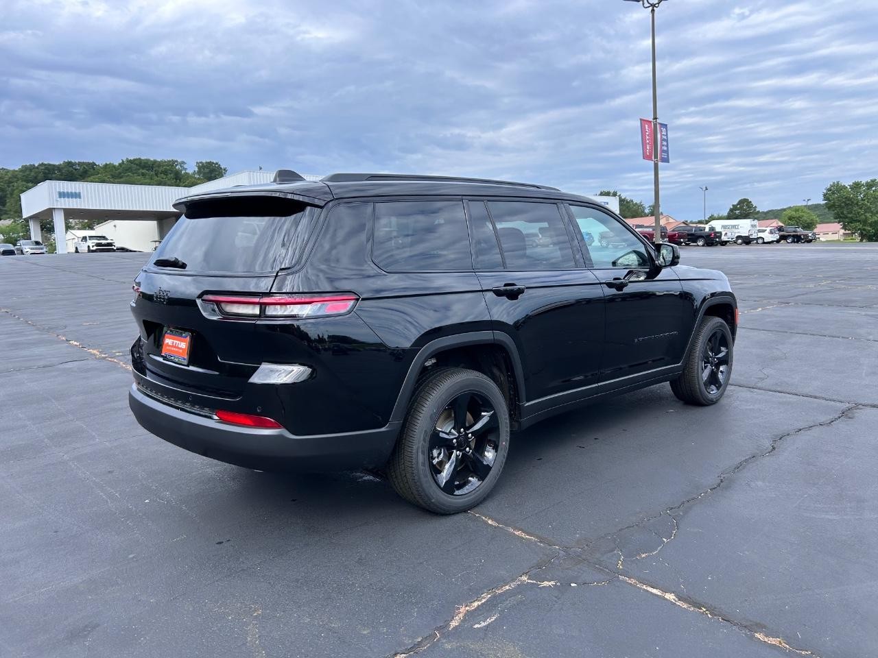 2025 Diamond Black Crystal Pearlcoat Jeep Grand Cherokee L Altitude X 4X4 SUV