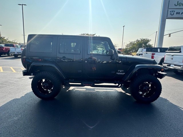 Used 2016 Jeep Wrangler Unlimited Sahara with VIN 1C4BJWEG8GL285215 for sale in Wood River, IL