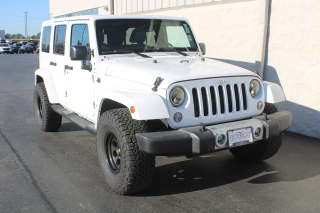 Used 2015 Jeep Wrangler Unlimited Sahara with VIN 1C4BJWEG3FL654450 for sale in Wood River, IL