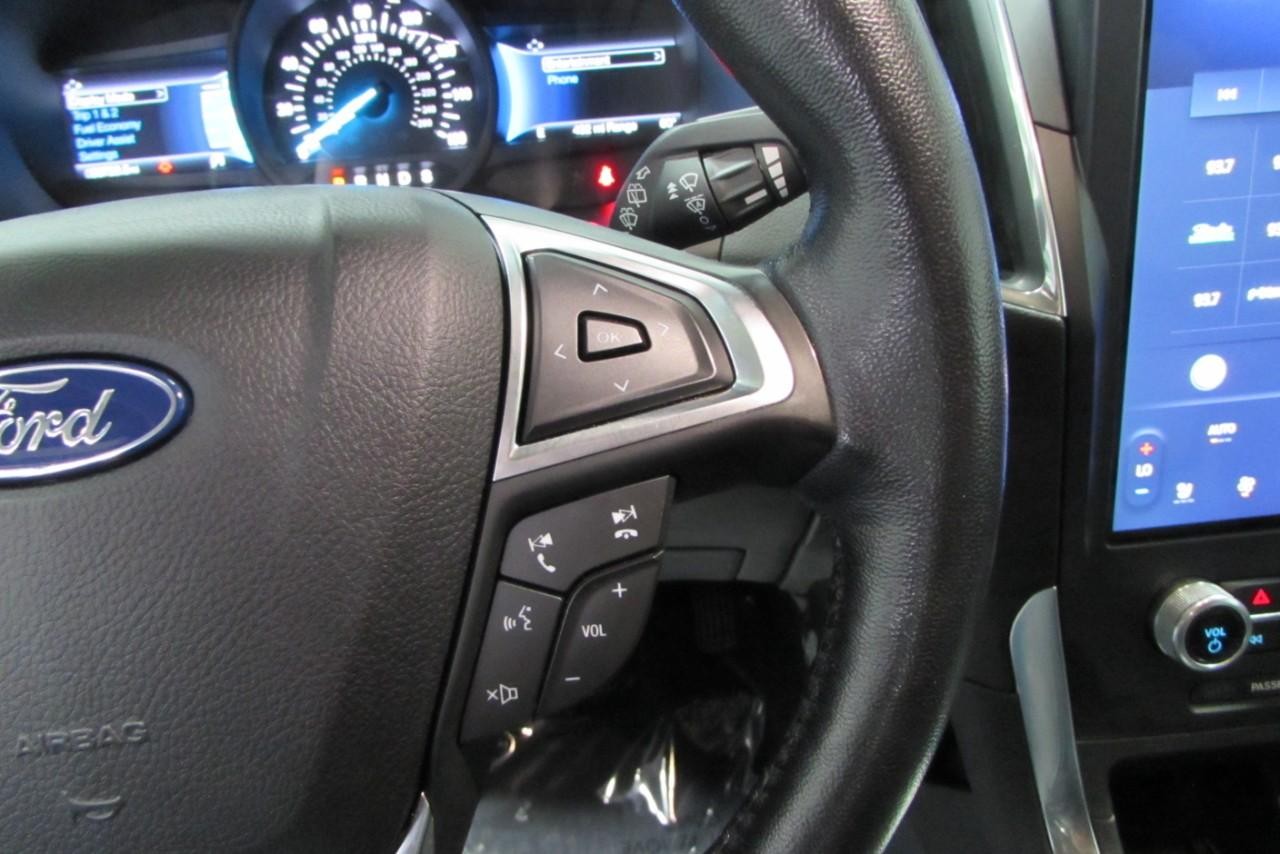 2023 Iconic Silver Metallic Ford Edge Titanium AWD SUV