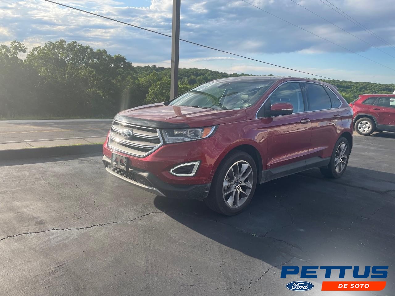 2016 Ruby Red Metallic Tinted Clearcoat Ford Edge Titanium FWD SUV