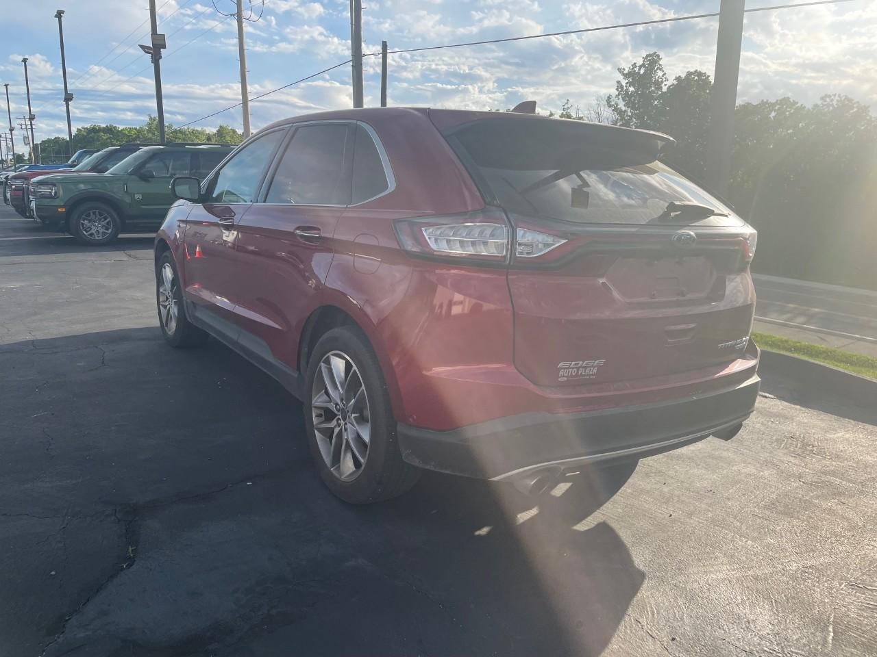 2016 Ruby Red Metallic Tinted Clearcoat Ford Edge Titanium FWD SUV