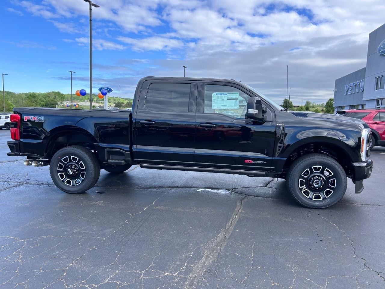 2025 Agate Black Metallic Ford Super Duty F-250 SRW Platinum 703A 4X4 Truck