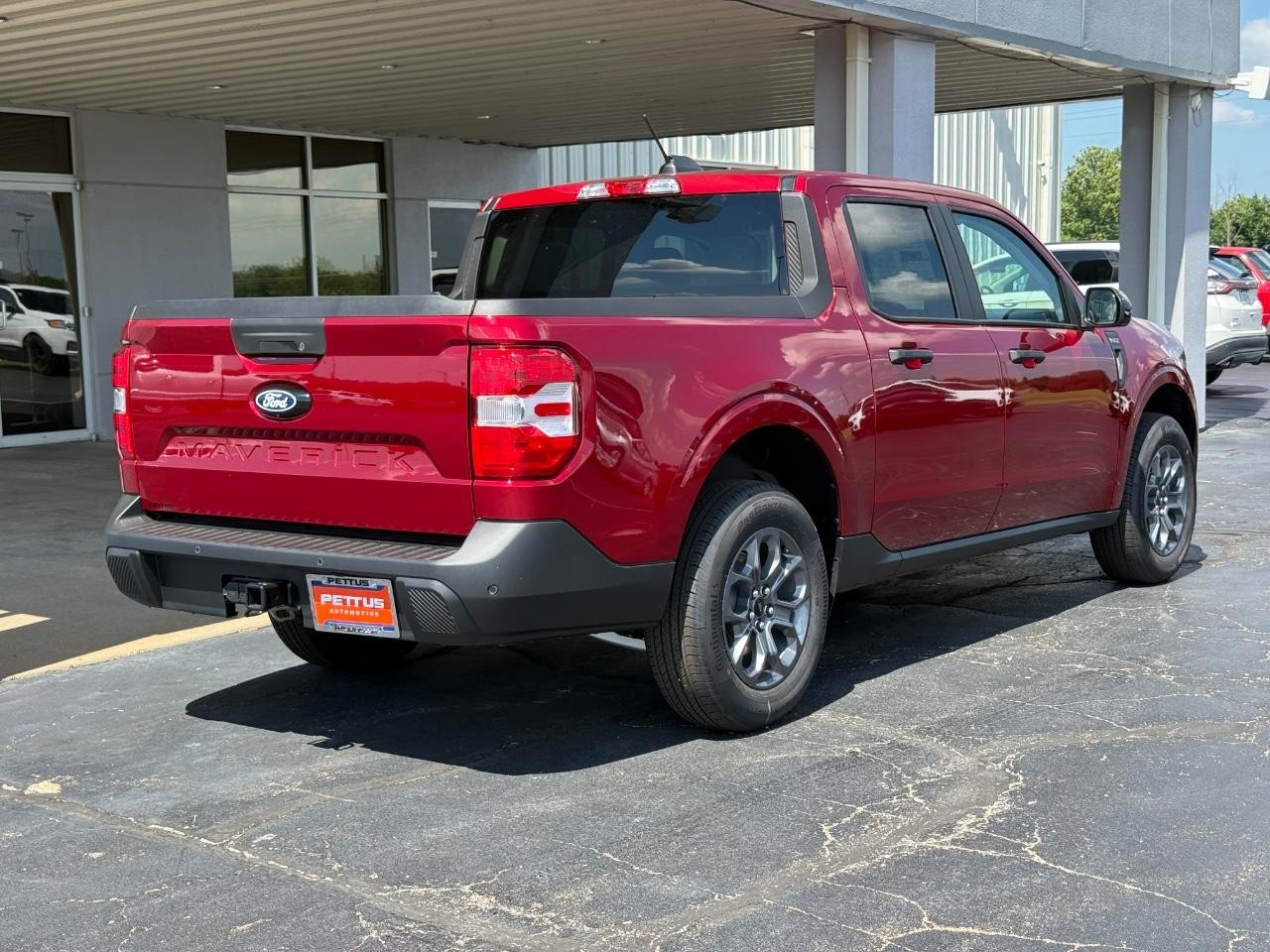 2025 Ruby Red Metallic Tinted Clearcoat Ford Maverick XLT AWD Truck