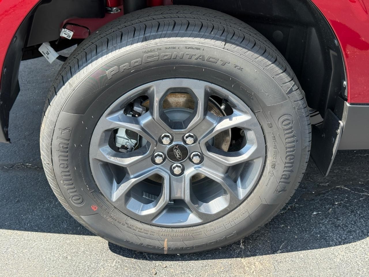 2025 Ruby Red Metallic Tinted Clearcoat Ford Maverick XLT AWD Truck
