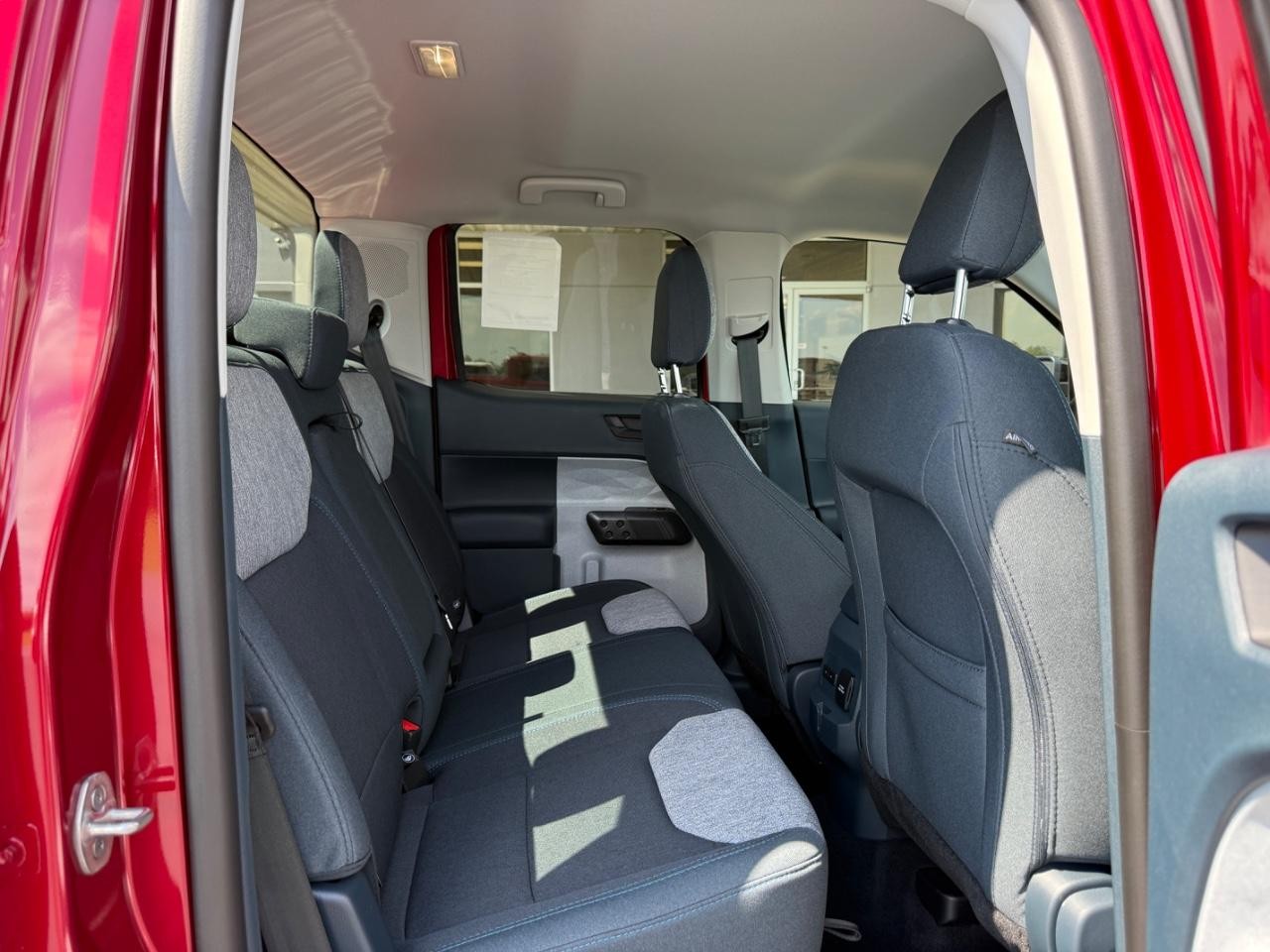 2025 Ruby Red Metallic Tinted Clearcoat Ford Maverick XLT AWD Truck