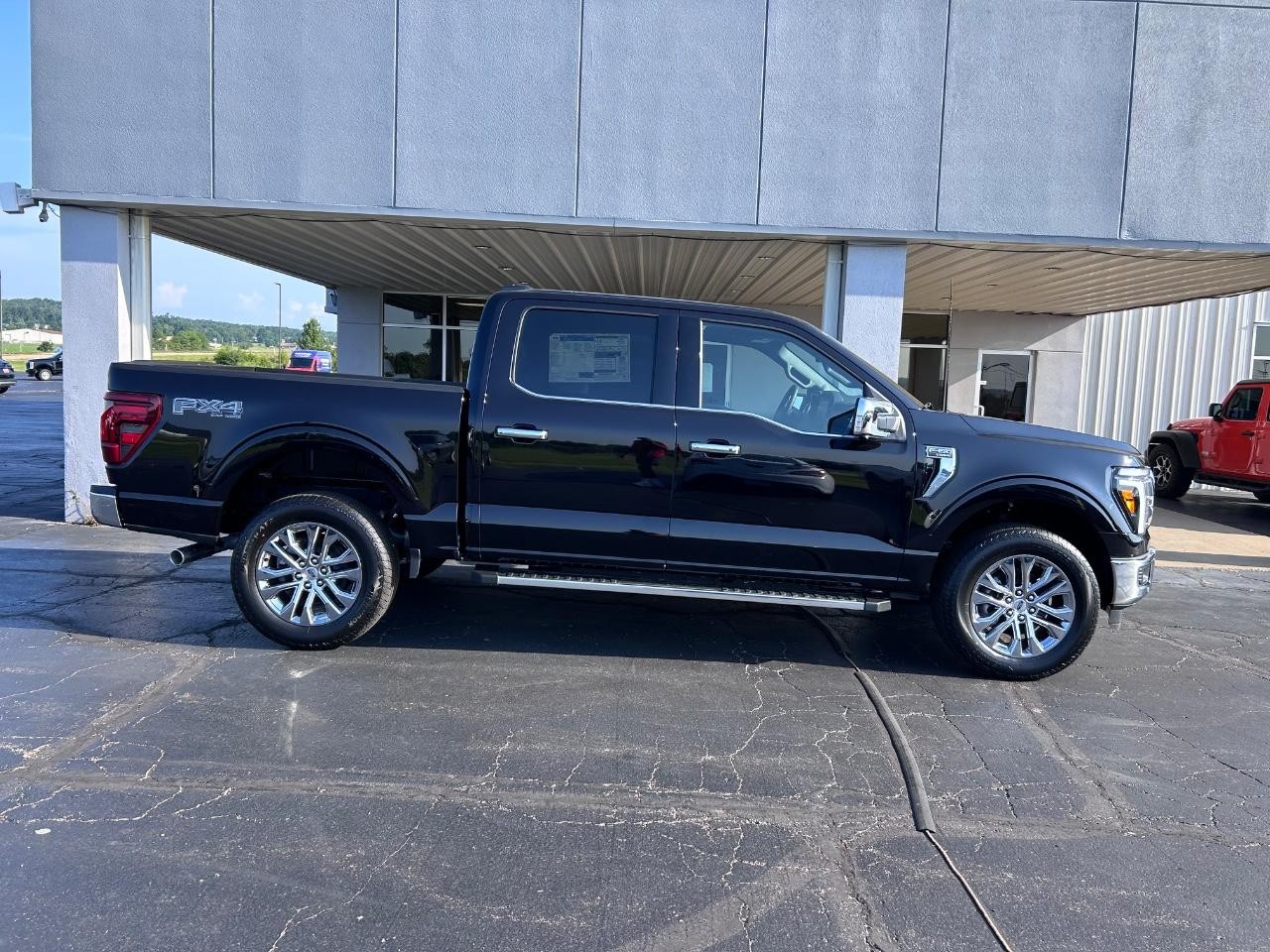 2025 Agate Black Metallic Ford F-150 Lariat 4X4 Truck