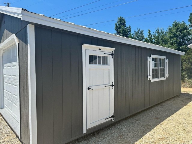 more details - twin city barns painted cabin with garage door