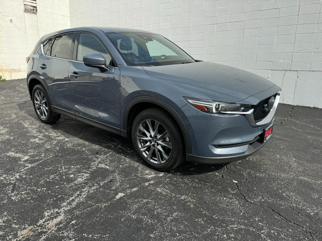 Used 2021 Mazda CX-5 Signature with VIN JM3KFBEY8M0129084 for sale in Saint Louis, MO