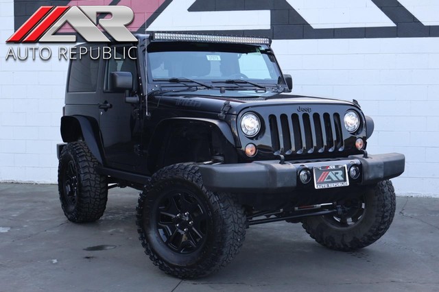 2017 Jeep Wrangler Willys Wheeler 4X4 6-speed manual w/freedom top & AC at Auto Republic in Cypress CA